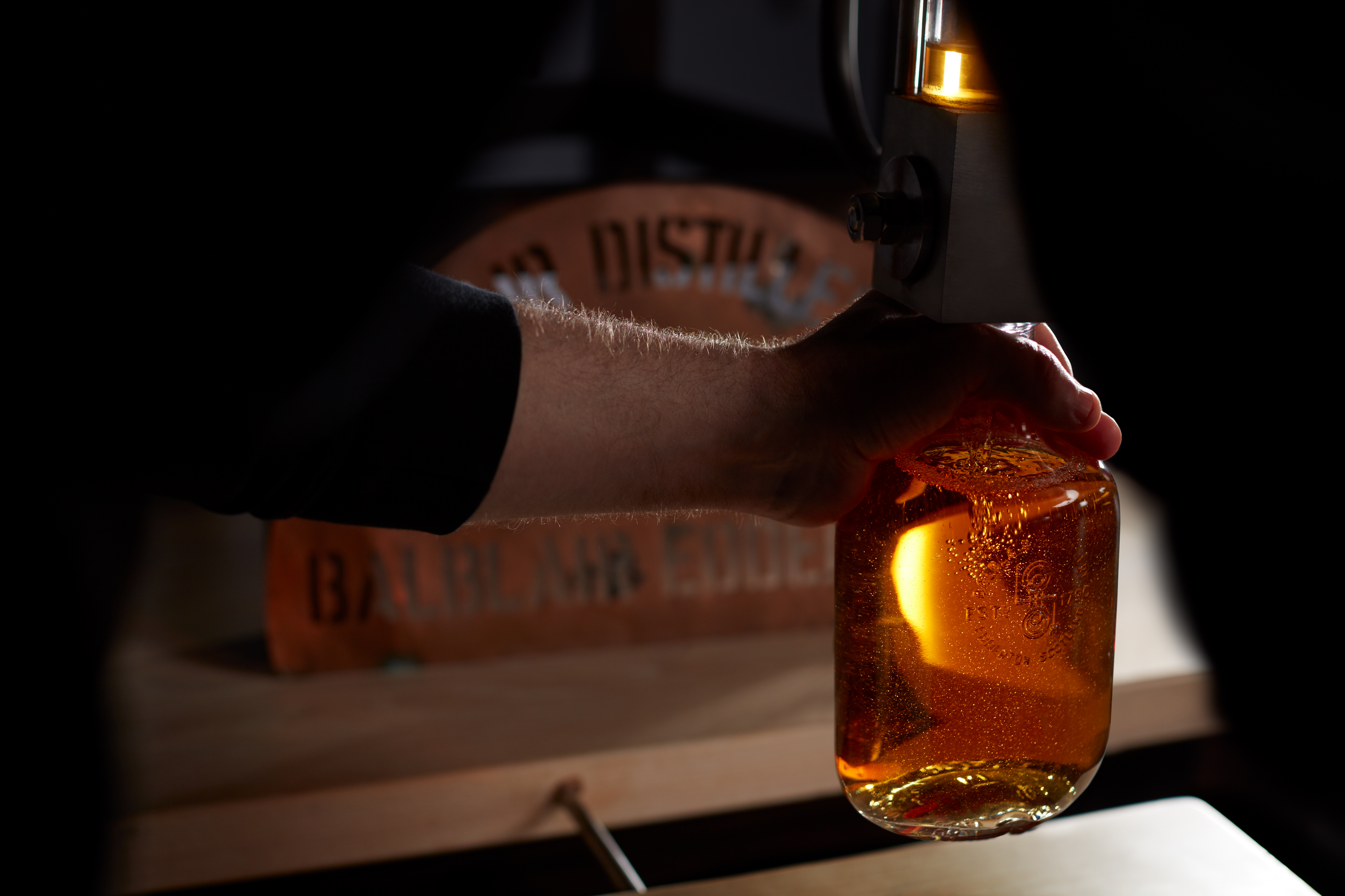 Balblair Whisky hand bottle - we welcome visitors to buy a bottle from a hand-selected cask which you can fill, cork, seal and label yourself.